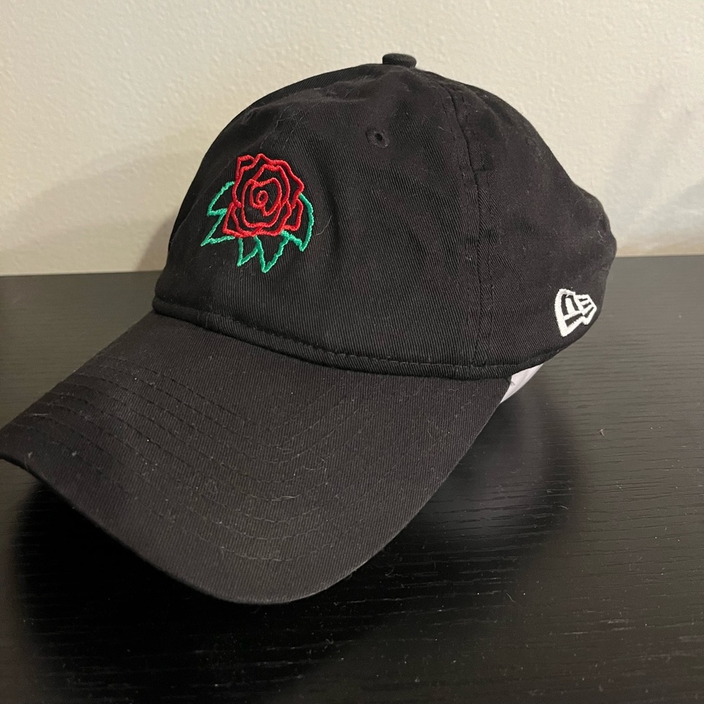 New Era baseball hat.
